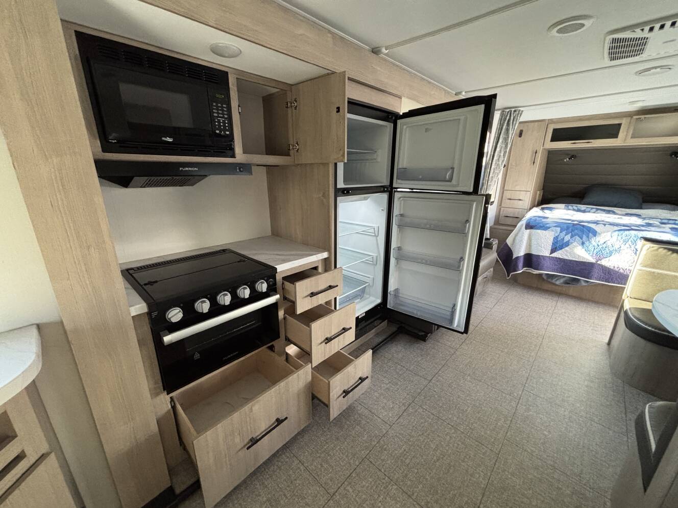 A photo of this 2025 Grand Design IMAGINE XLS 22MLE