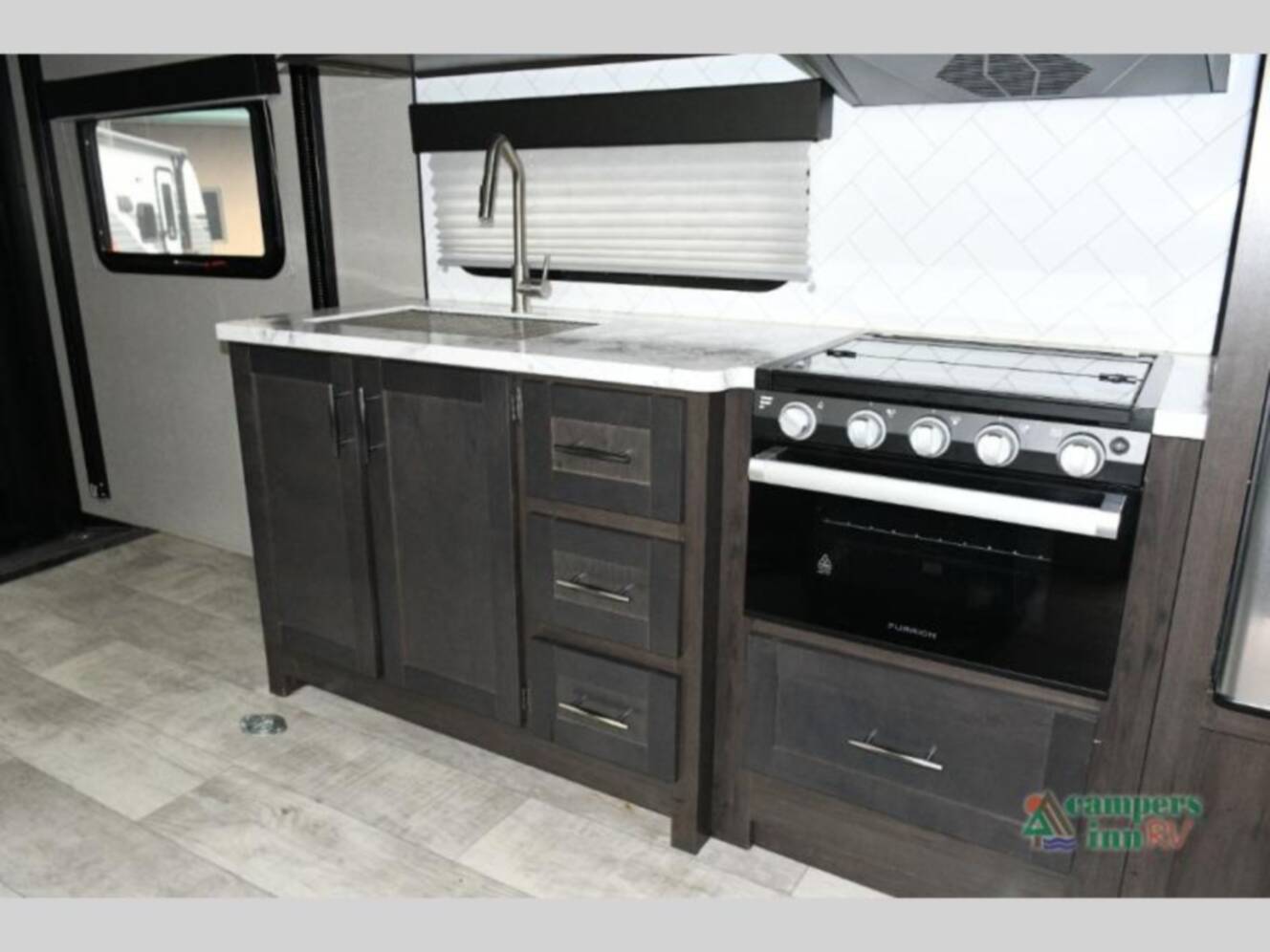 A photo of this 2023 Grand Design Momentum 21G