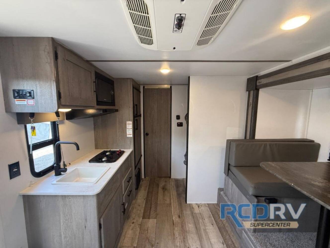 A photo of this 2021 Keystone Rv Springdale Mini 1760BH