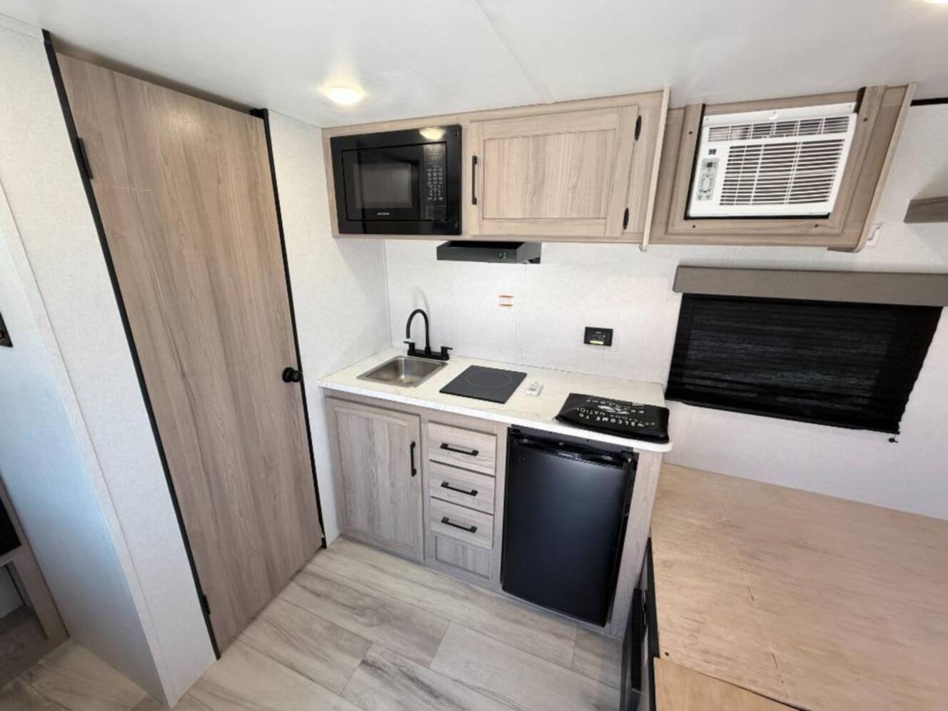 A photo of this 2026 Keystone Rv Coleman 13R