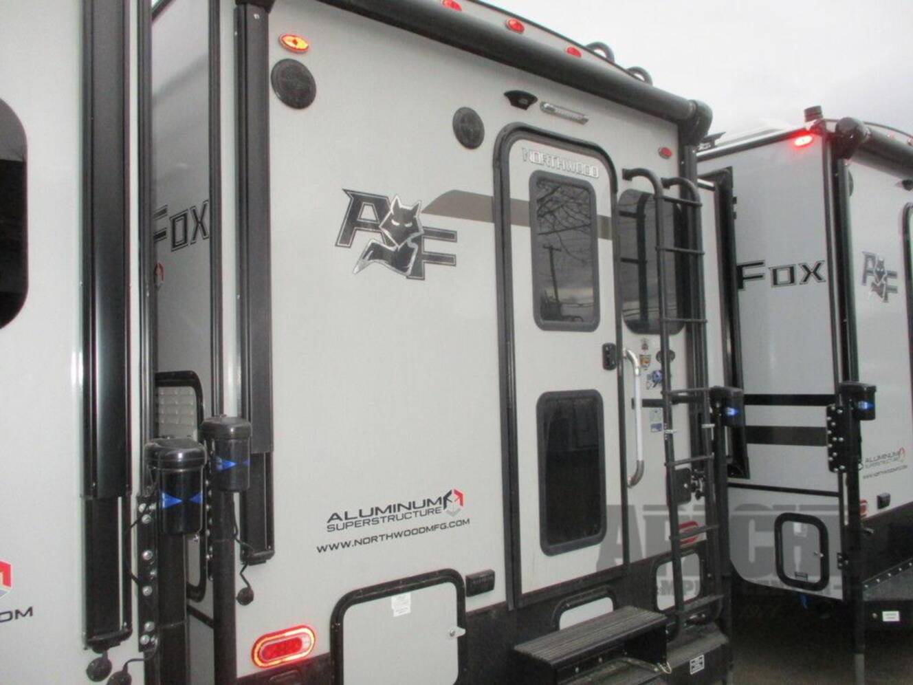 A photo of this 2026 Northwood Arctic Fox Camper 811LB Lithium Package