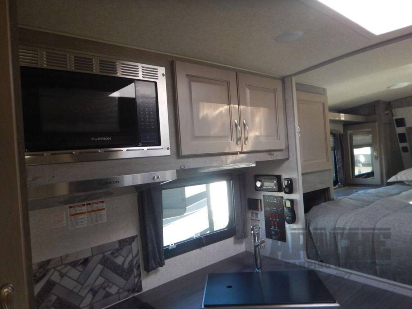 A photo of this 2026 Northwood Arctic Fox Camper 811SB Lithium Package