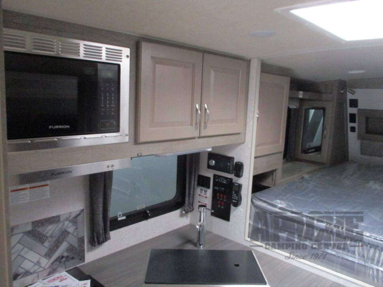 A photo of this 2026 Northwood Arctic Fox Camper 811LB Lithium Package