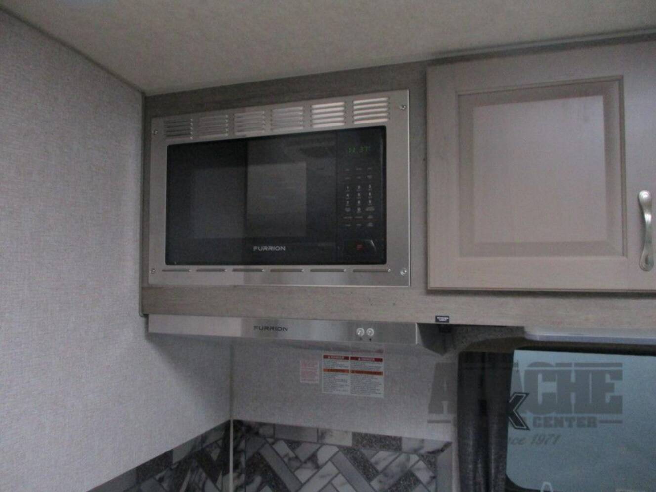 A photo of this 2026 Northwood Arctic Fox Camper 811LB Lithium Package