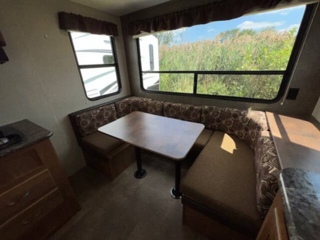 A photo of this 2018 Keystone Springdale Summerland Mini 1750RD Front East-West Queen