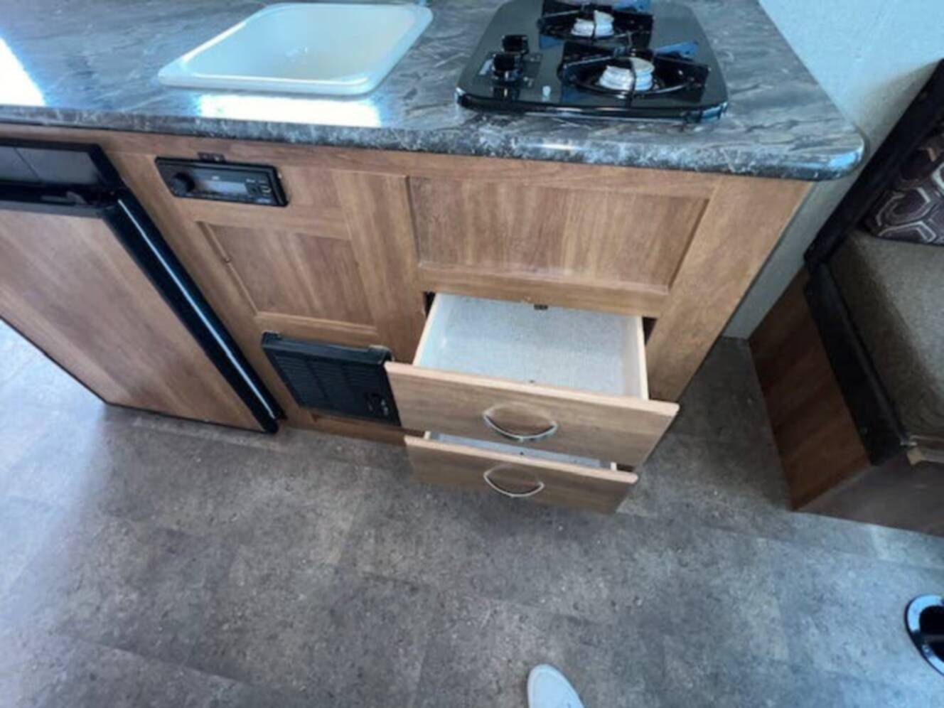 A photo of this 2018 Keystone Springdale Summerland Mini 1750RD Front East-West Queen