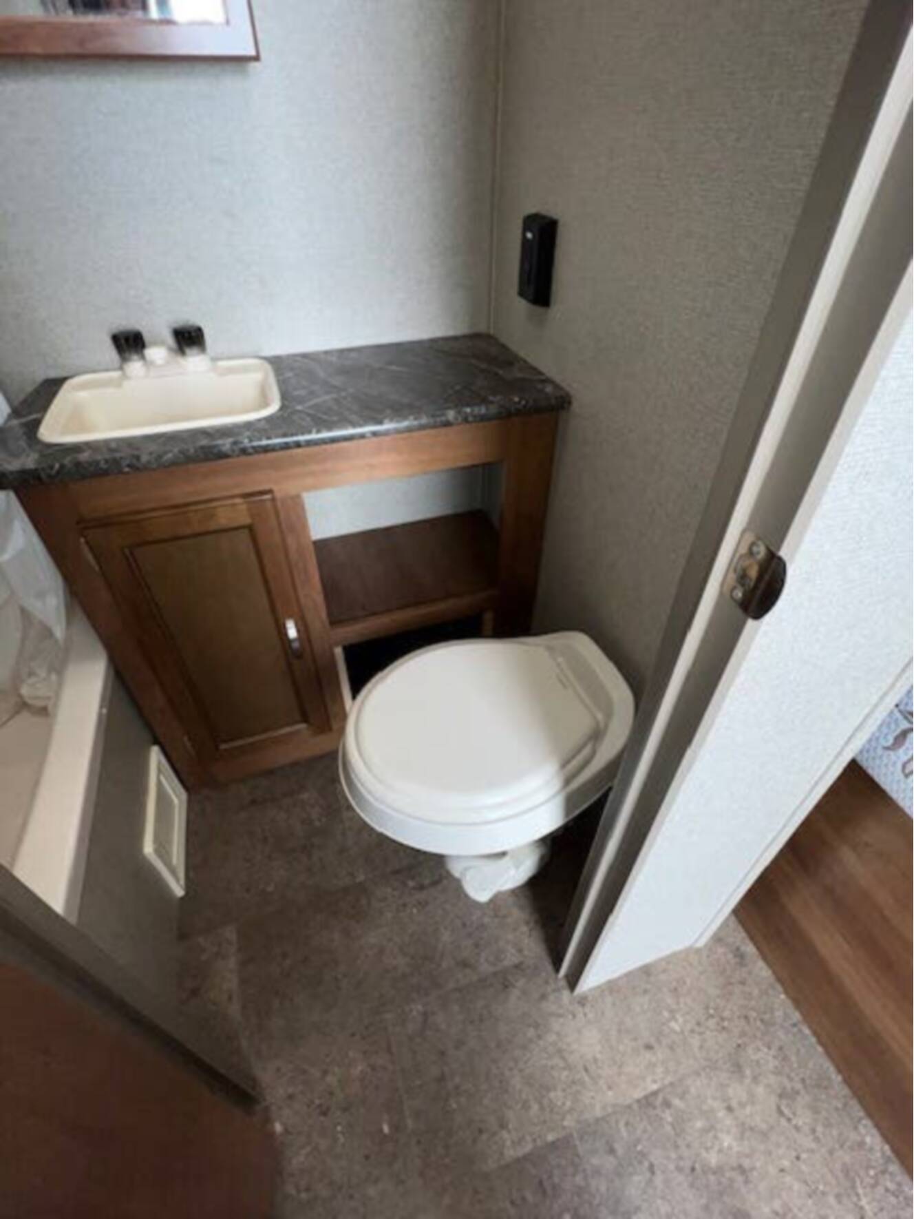 A photo of this 2018 Keystone Springdale Summerland Mini 1750RD Front East-West Queen