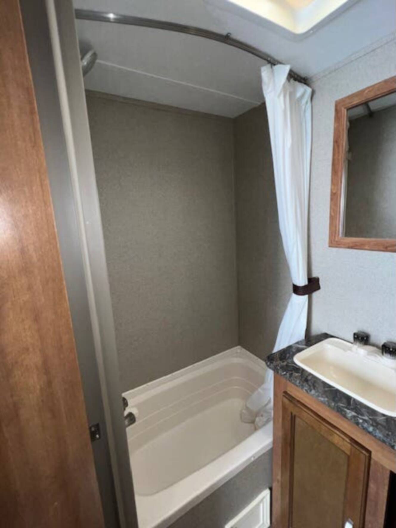 A photo of this 2018 Keystone Springdale Summerland Mini 1750RD Front East-West Queen