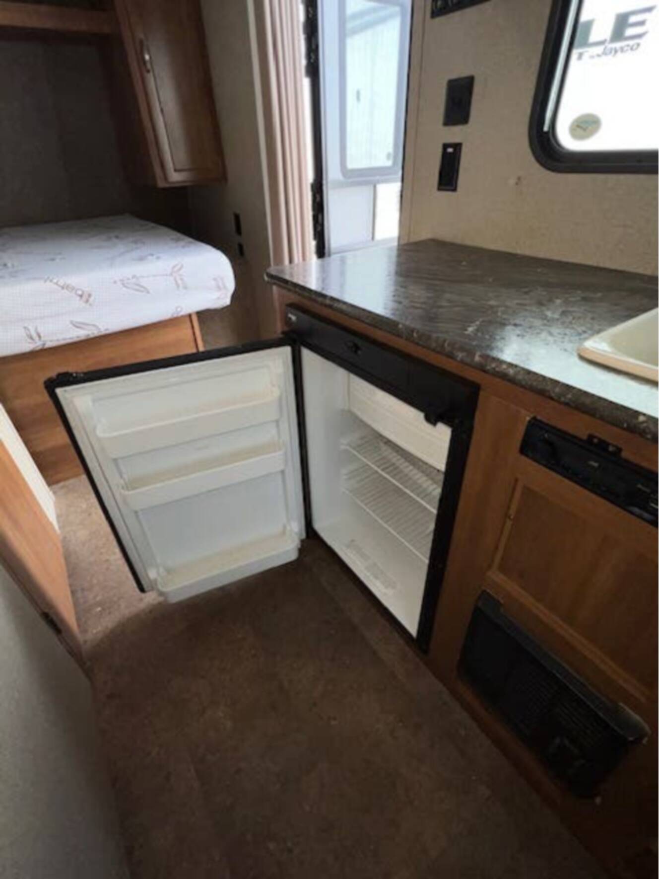 A photo of this 2018 Keystone Springdale Summerland Mini 1750RD Front East-West Queen