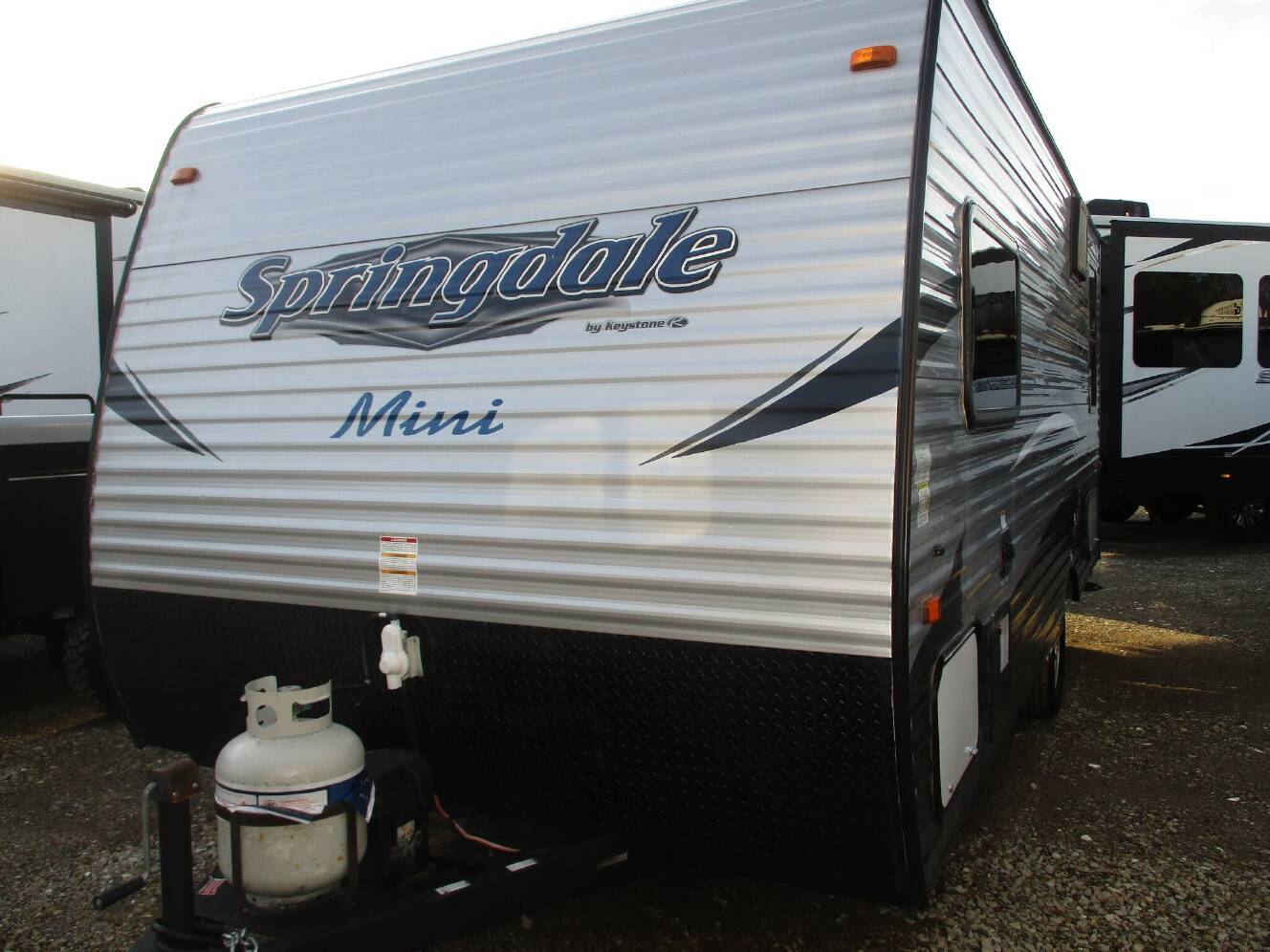 A photo of this 2018 Keystone Springdale Summerland Mini 1750RD Front East-West Queen