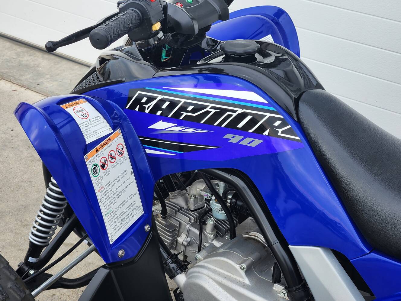 A photo of this 2022 Yamaha Raptor 90