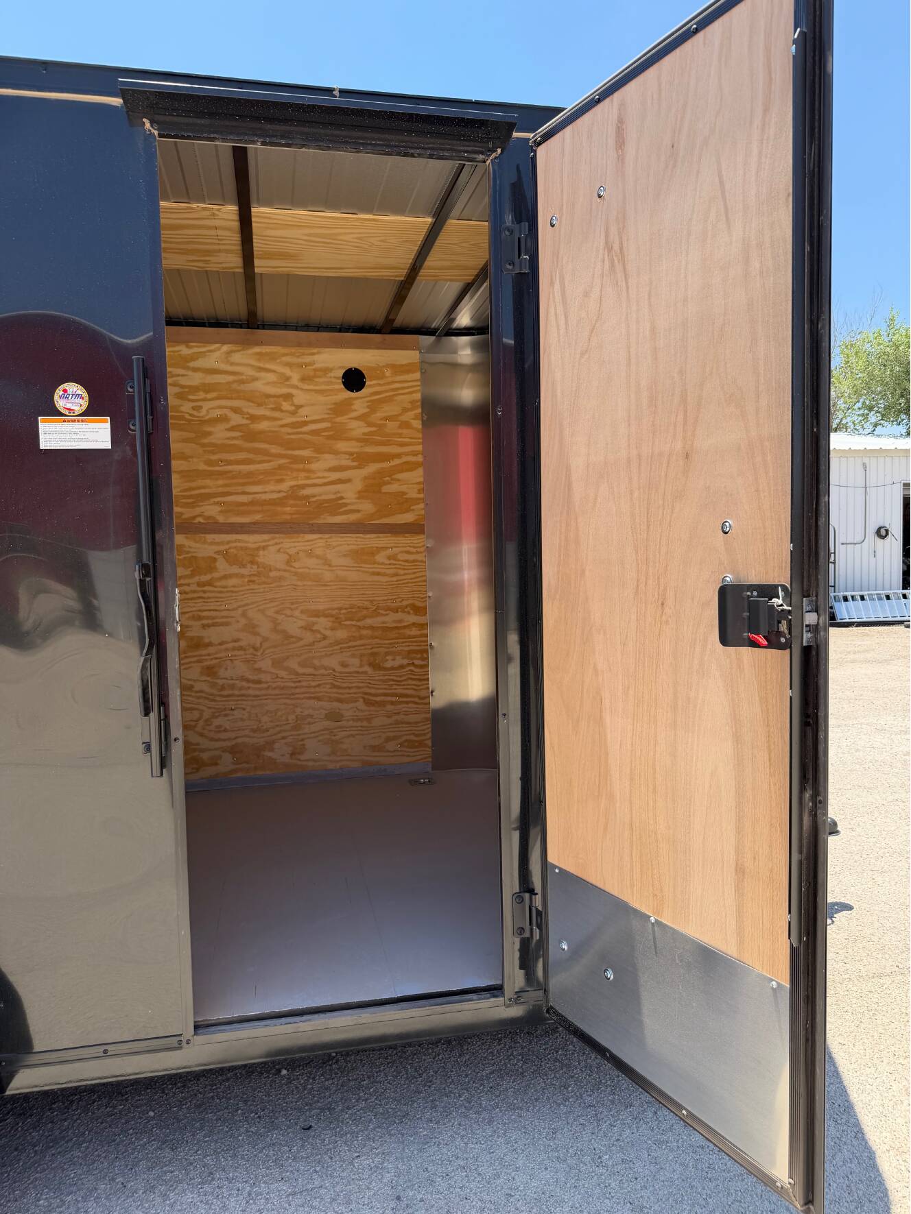 A photo of this 2026 Cargo Craft 7X16X7 EV / W SPARE