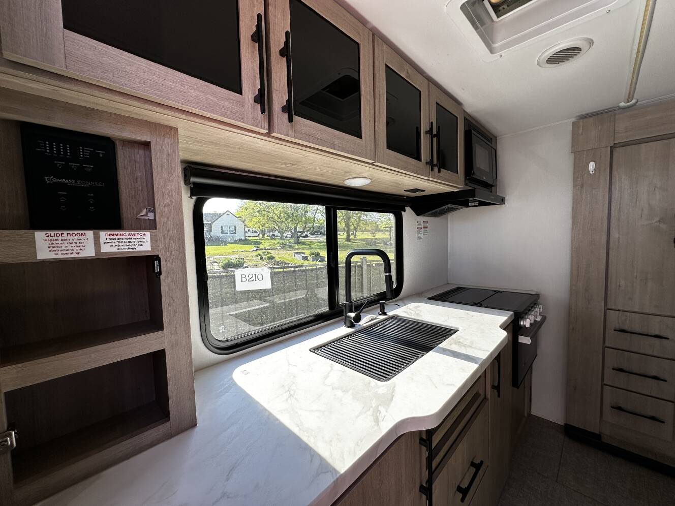 A photo of this 2025 Grand Design IMAGINE XLS 23LDE