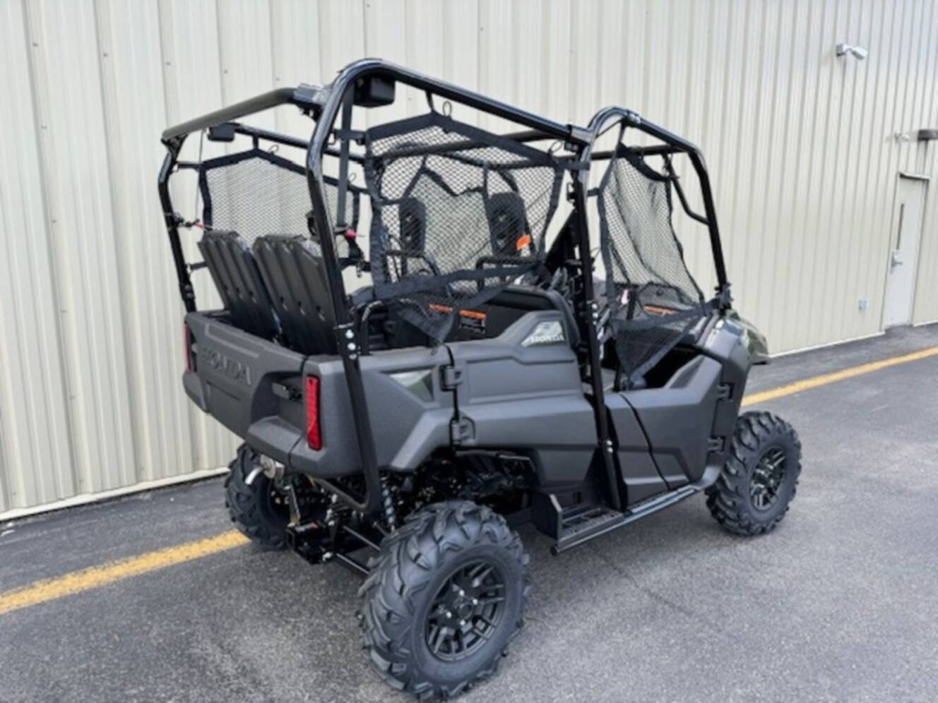 A photo of this 2026 Honda® Pioneer 700-4 Deluxe