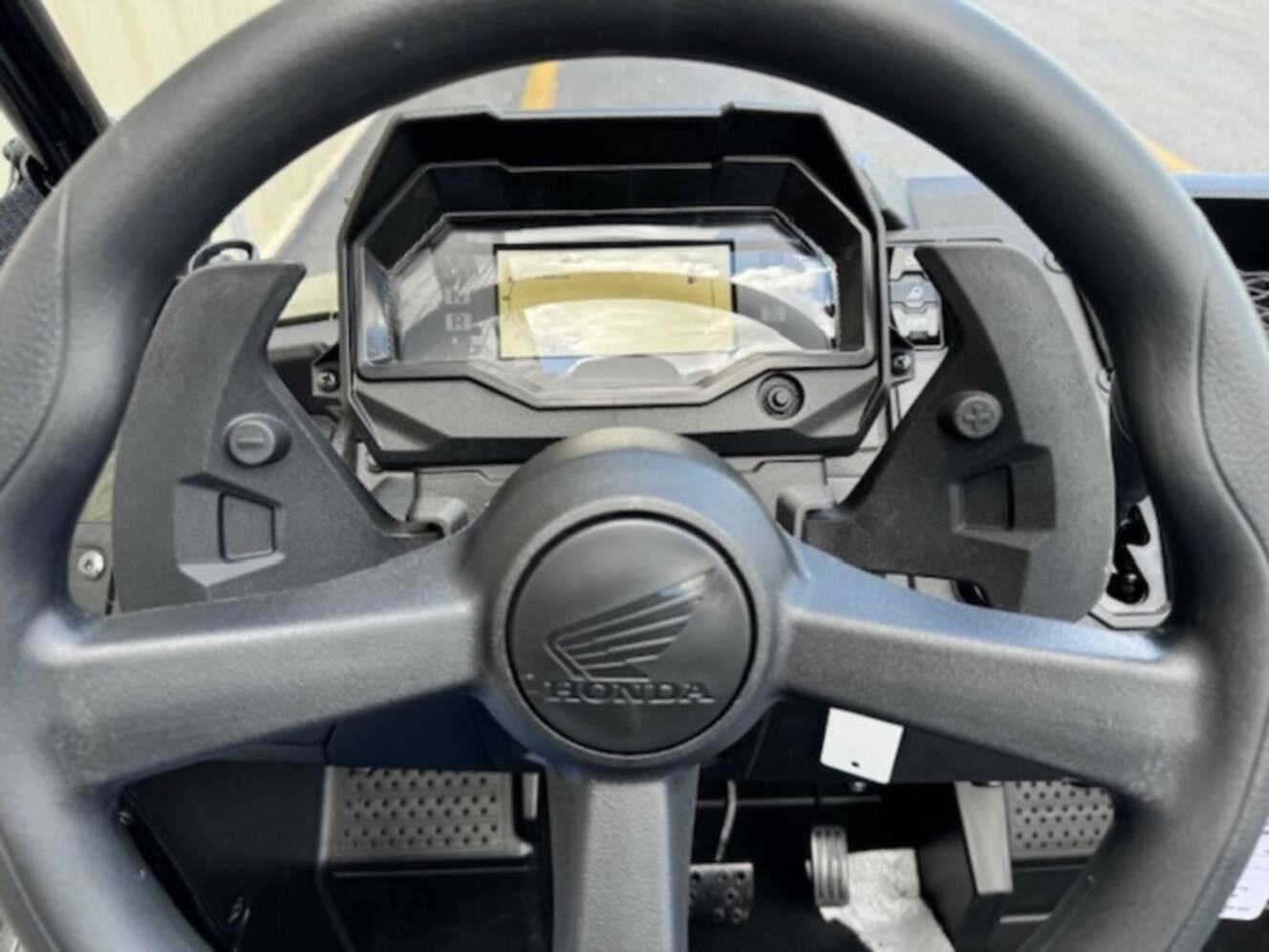 A photo of this 2026 Honda® Pioneer 700-4 Deluxe