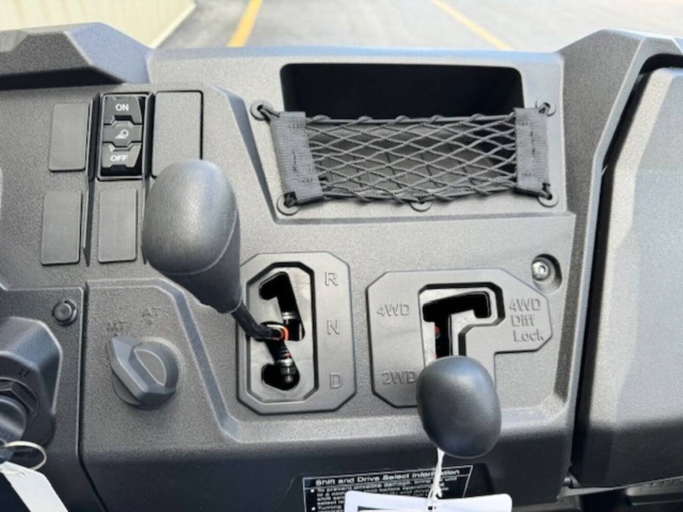 A photo of this 2026 Honda® Pioneer 700-4 Deluxe