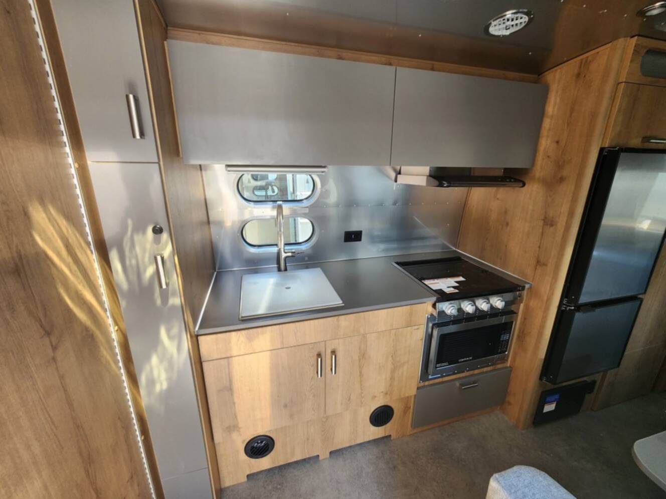 A photo of this 2026 Airstream Trade Wind 23FB Twin