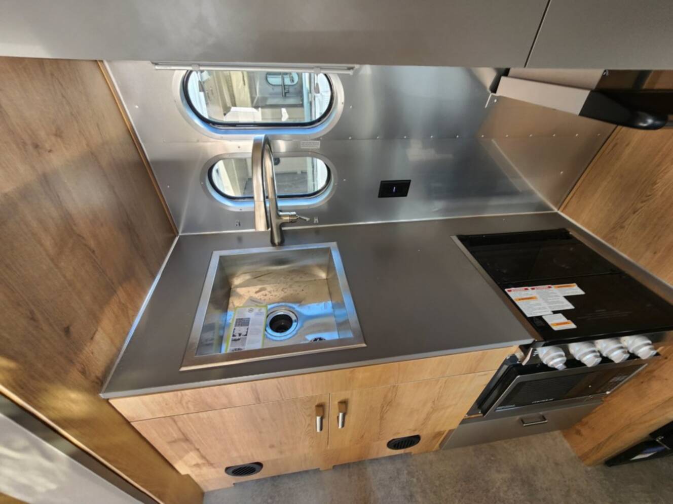 A photo of this 2026 Airstream Trade Wind 23FB Twin