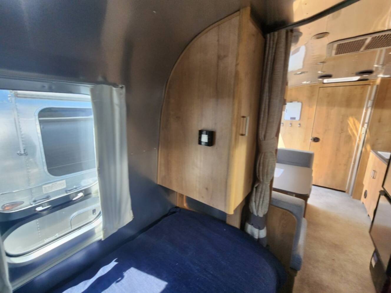 A photo of this 2026 Airstream Trade Wind 23FB Twin