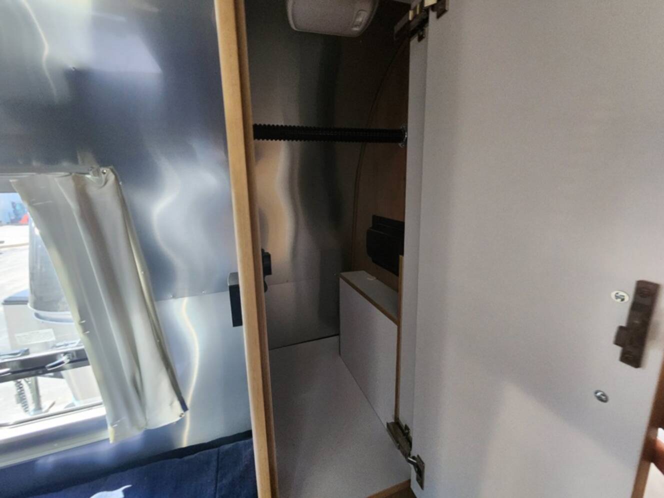 A photo of this 2026 Airstream Trade Wind 23FB Twin