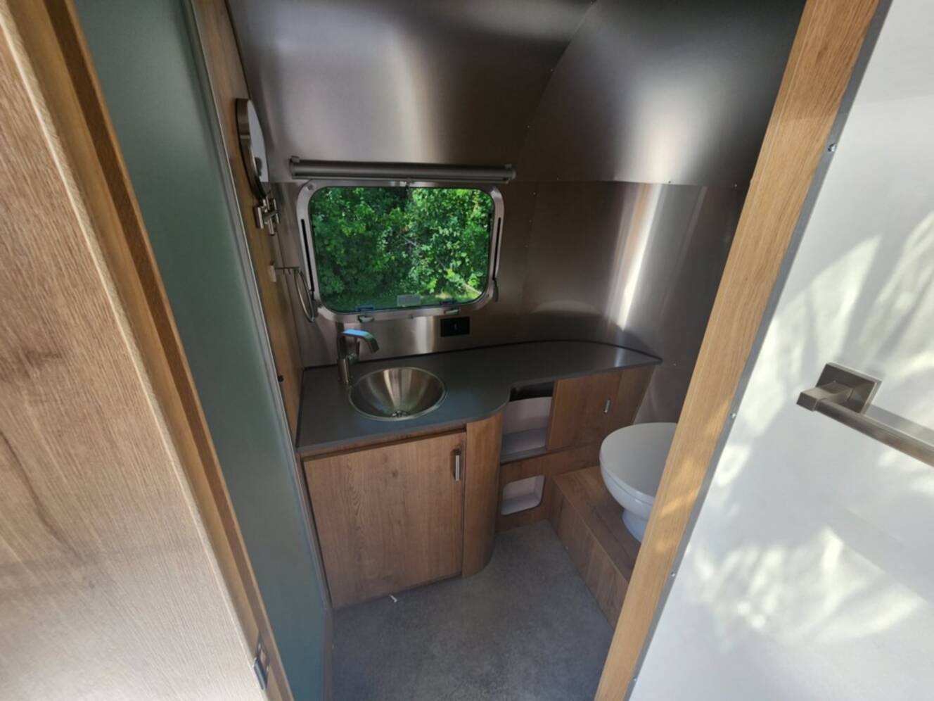 A photo of this 2026 Airstream Trade Wind 23FB Twin