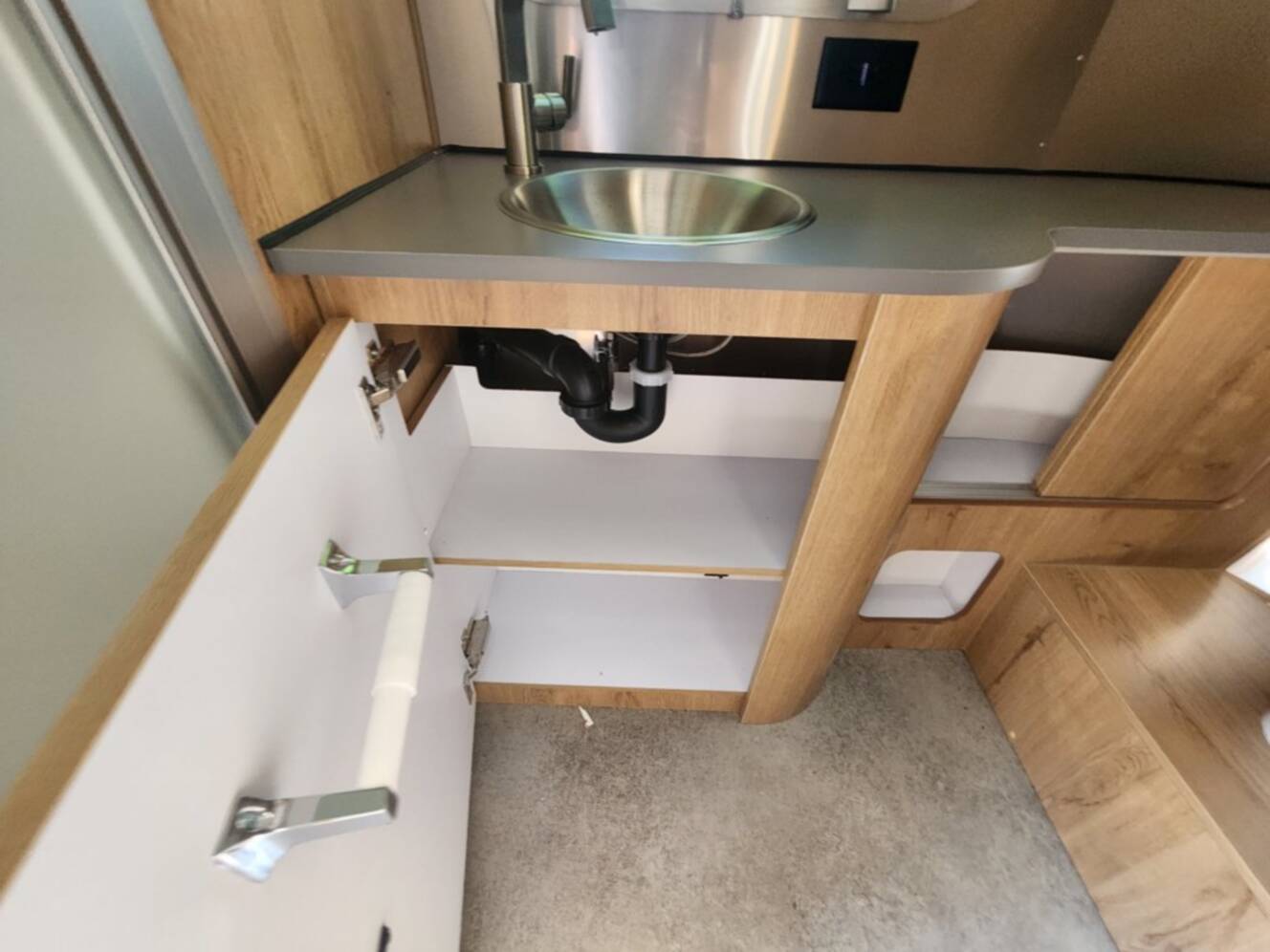 A photo of this 2026 Airstream Trade Wind 23FB Twin