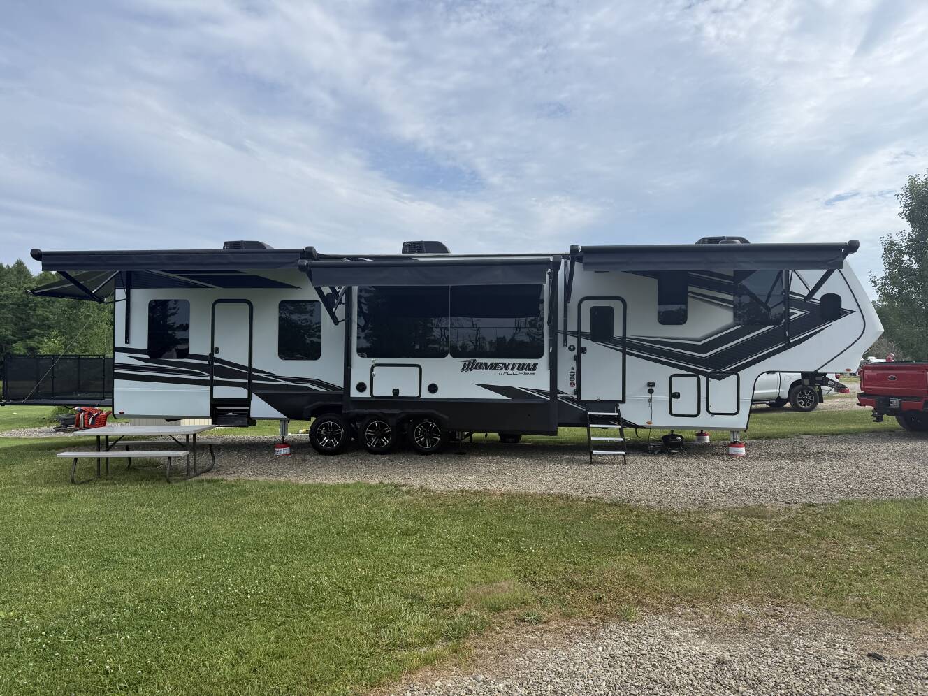 A photo of this 2023 Grand Design MOMENTUM M-CLASS 395MS