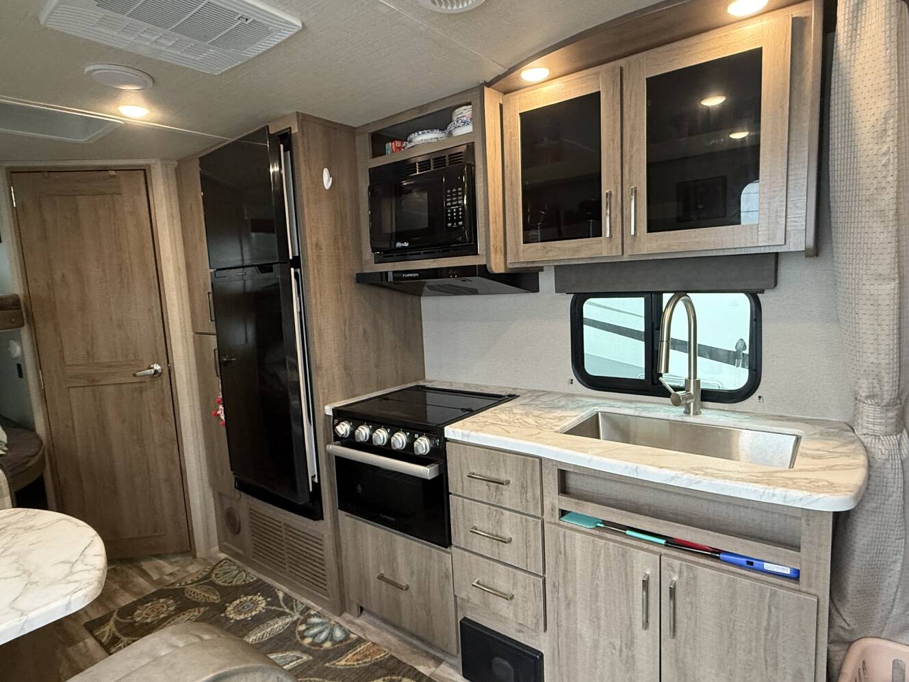 A photo of this 2022 Grand Design IMAGINE XLS 21BHE