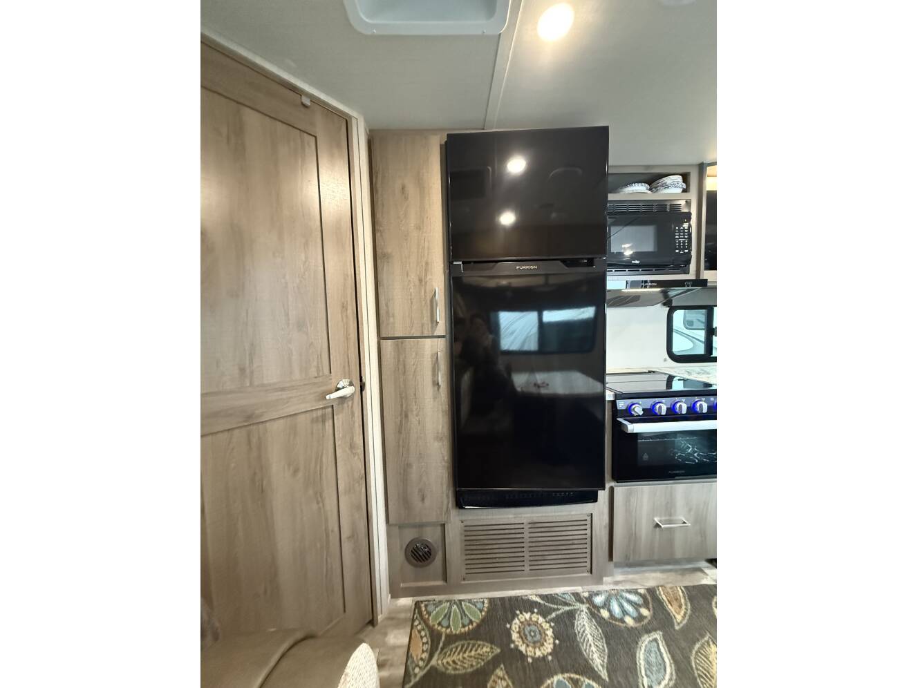 A photo of this 2022 Grand Design IMAGINE XLS 21BHE