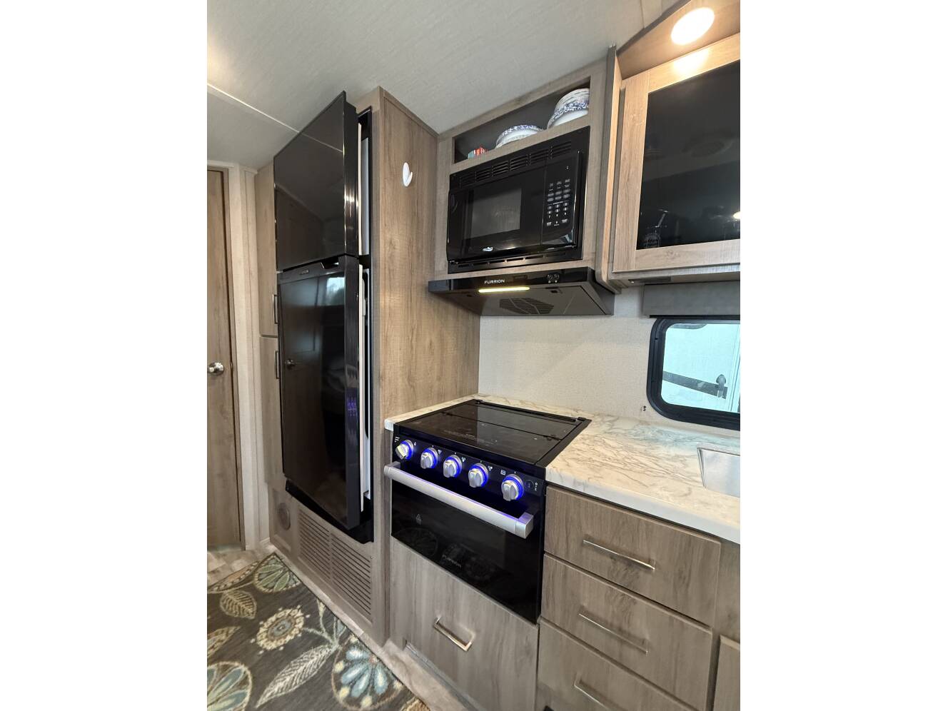 A photo of this 2022 Grand Design IMAGINE XLS 21BHE