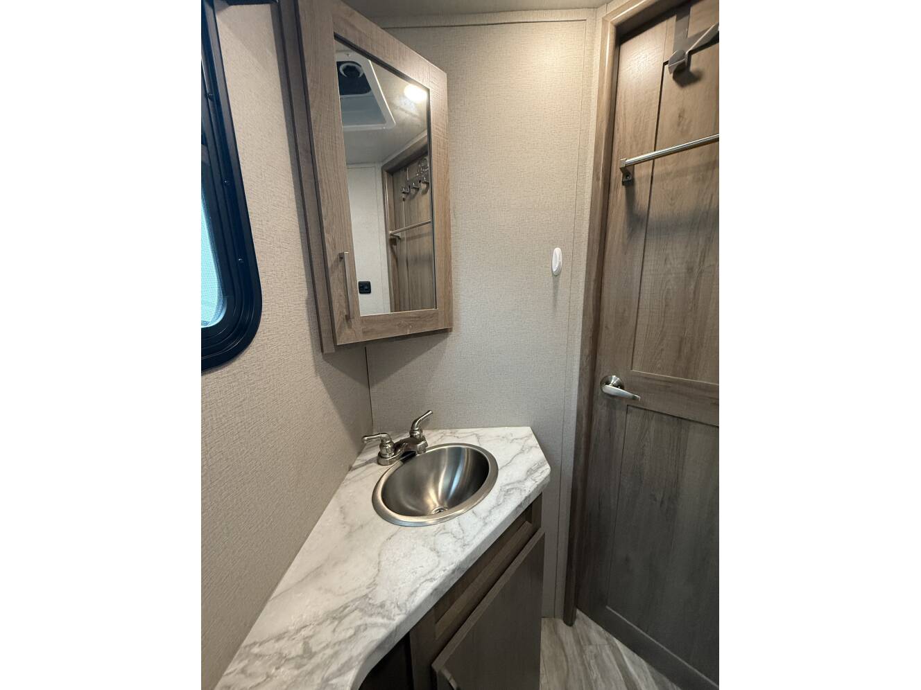 A photo of this 2022 Grand Design IMAGINE XLS 21BHE