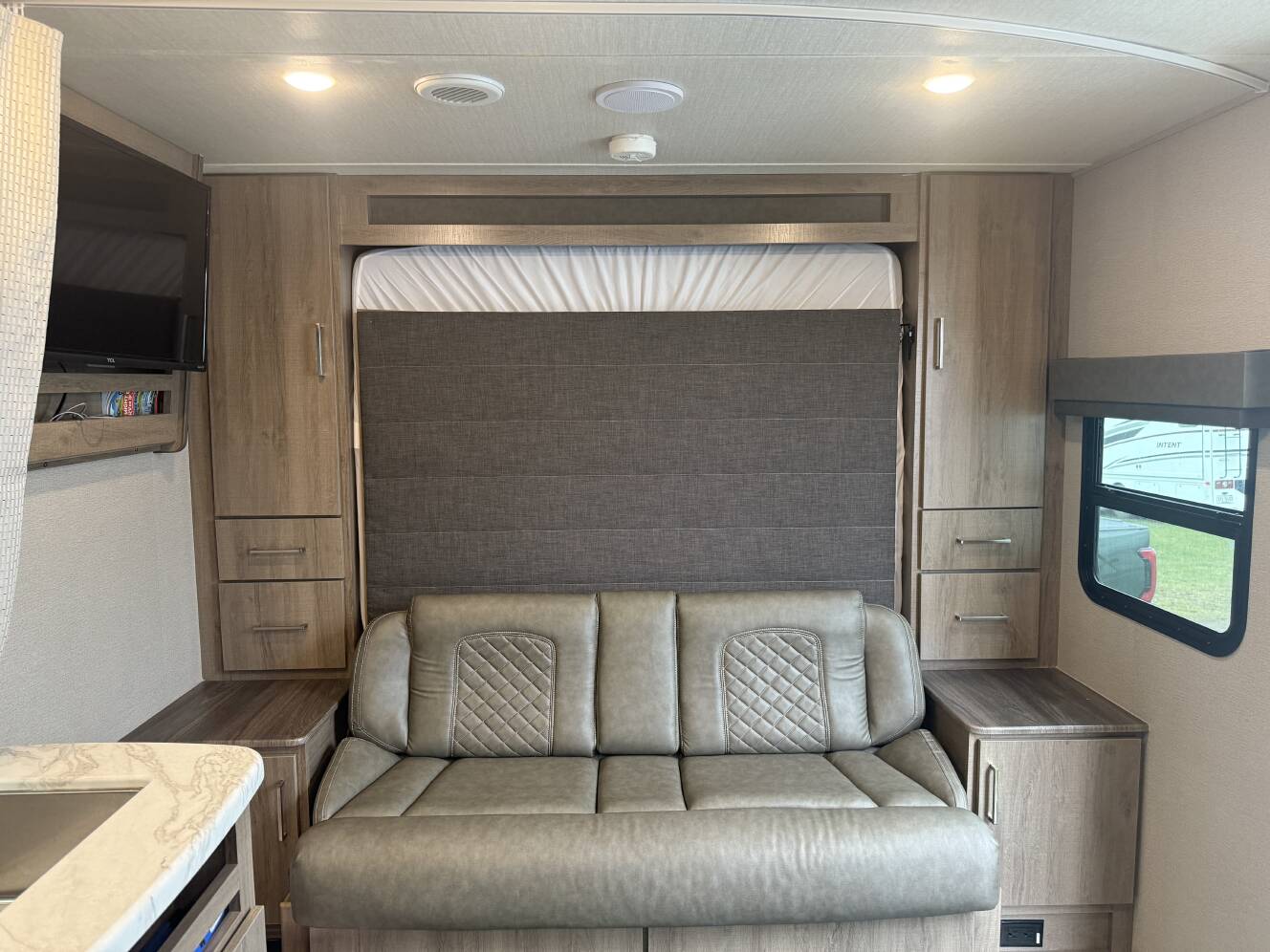 A photo of this 2022 Grand Design IMAGINE XLS 21BHE