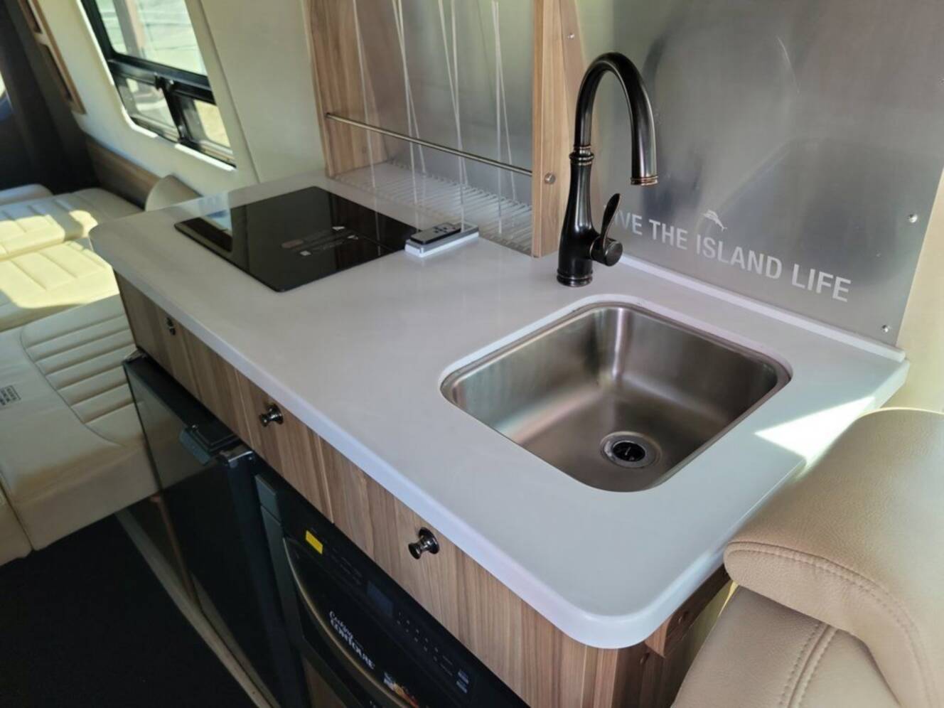 A photo of this 2023 Airstream Interstate 24GL 4x4 Tommy Bahama