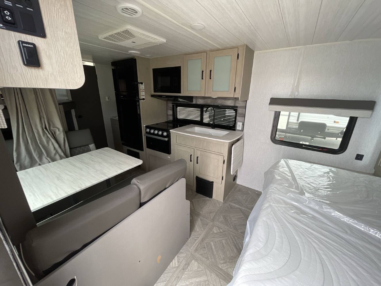 A photo of this 2023 Forest River WILDWOOD X-LITE 19DBXL