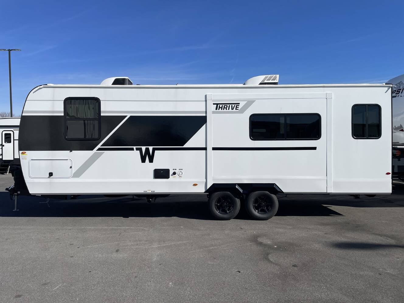 A photo of this 2026 Winnebago THRIVE 25RLS