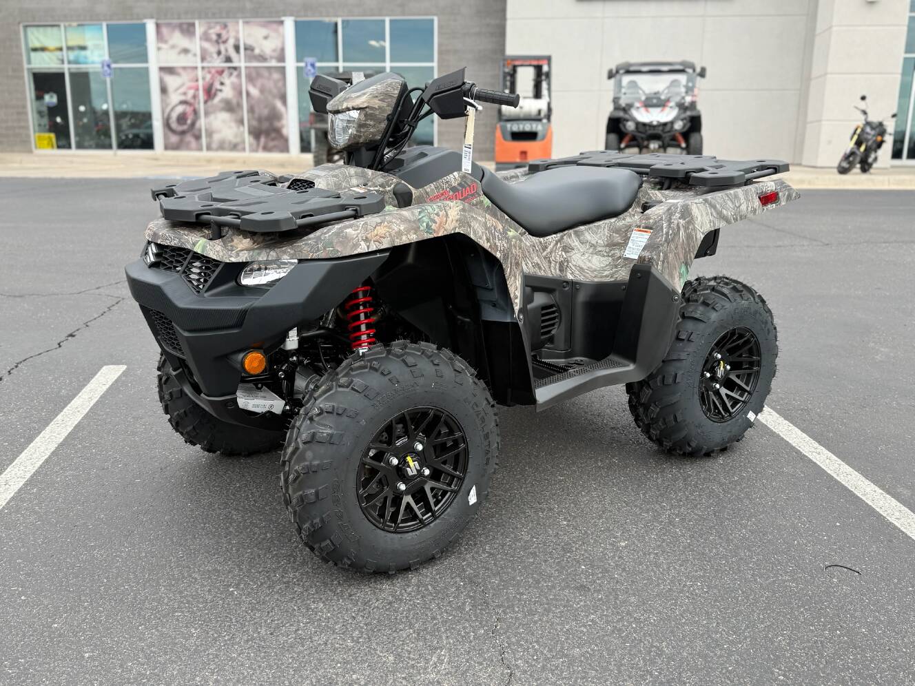 A photo of this 2025 Suzuki KingQuad 500AXi Power Steering SE Camo