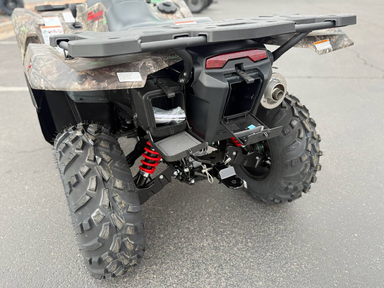 A photo of this 2025 Suzuki KingQuad 500AXi Power Steering SE Camo