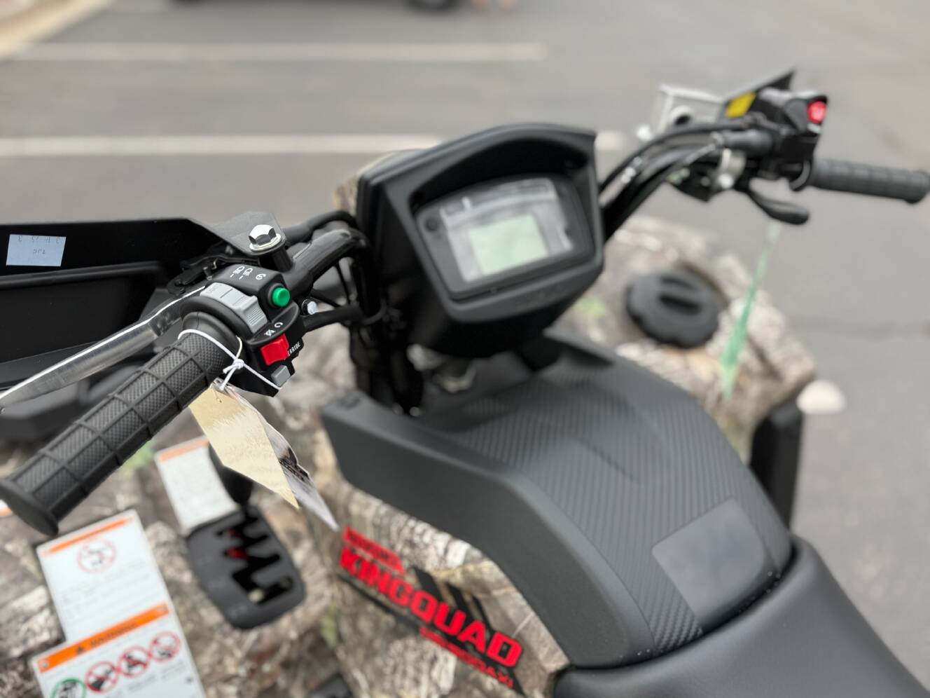 A photo of this 2025 Suzuki KingQuad 500AXi Power Steering SE Camo
