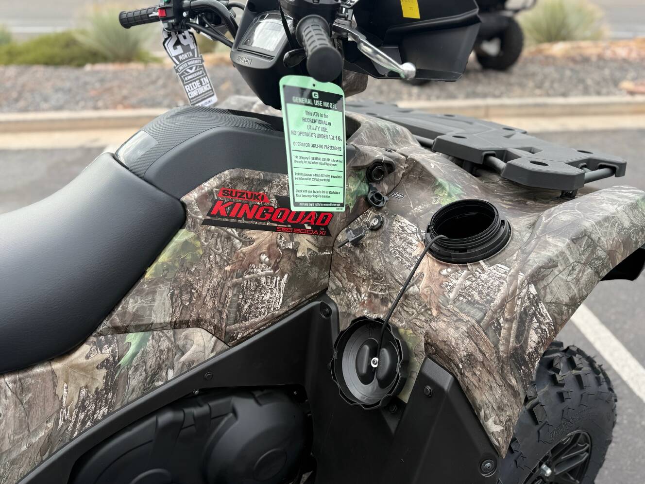 A photo of this 2025 Suzuki KingQuad 500AXi Power Steering SE Camo