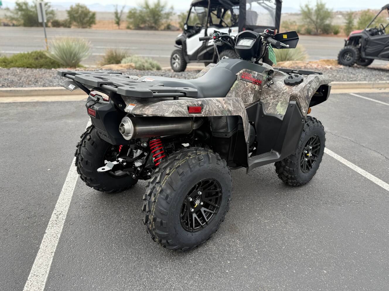 A photo of this 2025 Suzuki KingQuad 500AXi Power Steering SE Camo