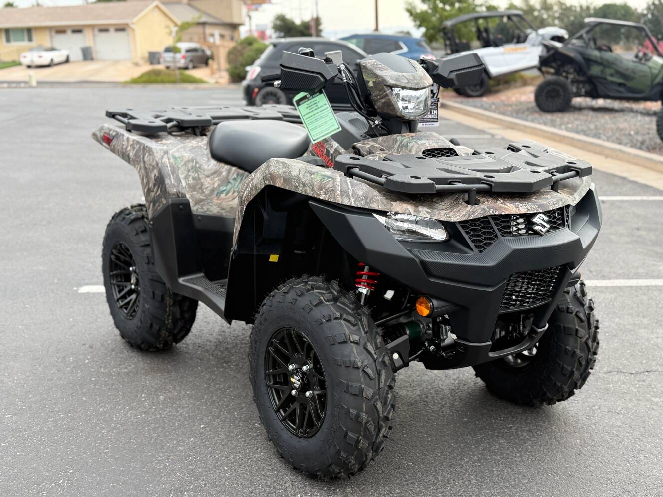 A photo of this 2025 Suzuki KingQuad 500AXi Power Steering SE Camo