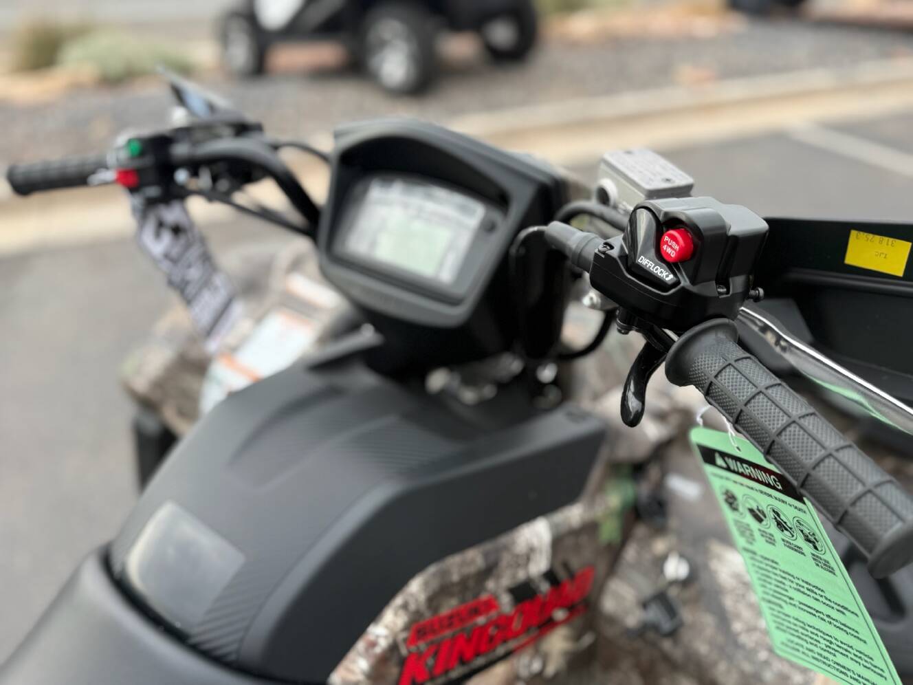 A photo of this 2025 Suzuki KingQuad 500AXi Power Steering SE Camo