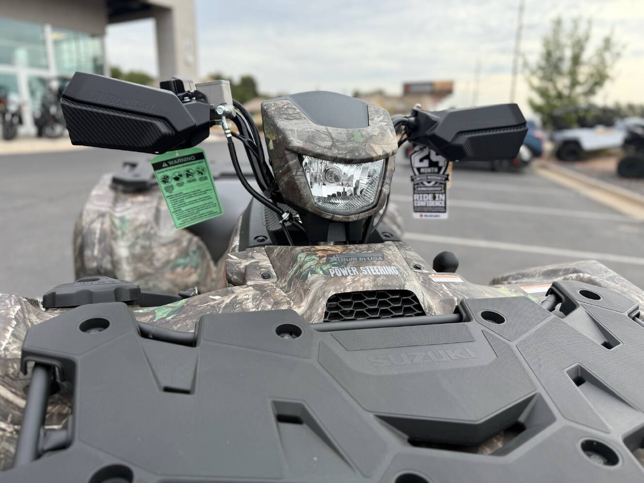 A photo of this 2025 Suzuki KingQuad 500AXi Power Steering SE Camo