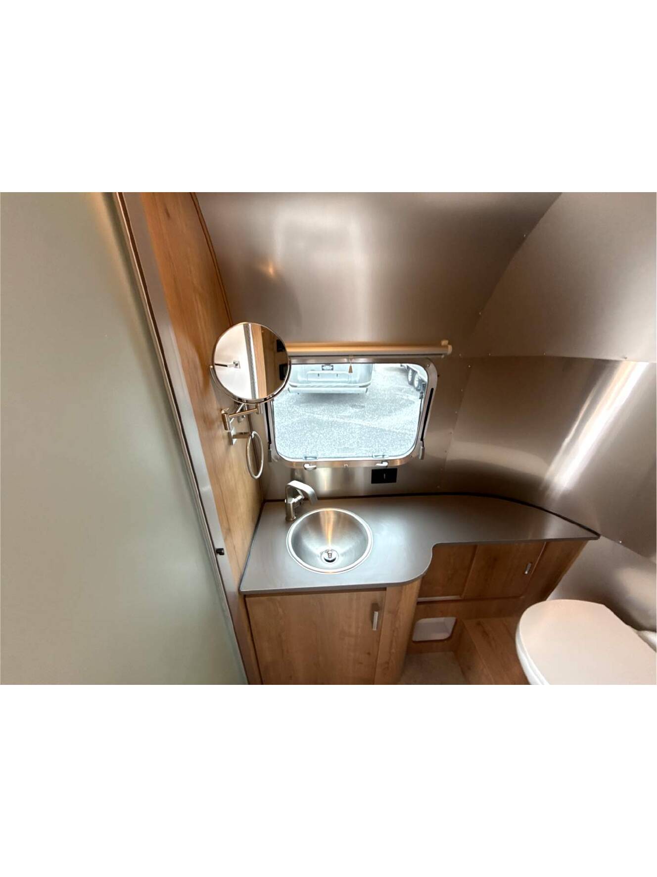 A photo of this 2026 Airstream Trade Wind 23FBT
