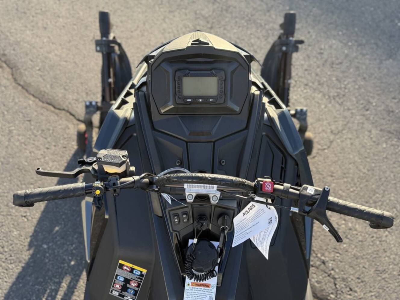 A photo of this 2026 Polaris 850 RMK Khaos 165 Gloss Black / Blue Dusk 850