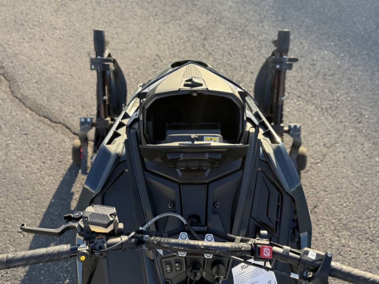A photo of this 2026 Polaris 850 RMK Khaos 165 Gloss Black / Blue Dusk 850