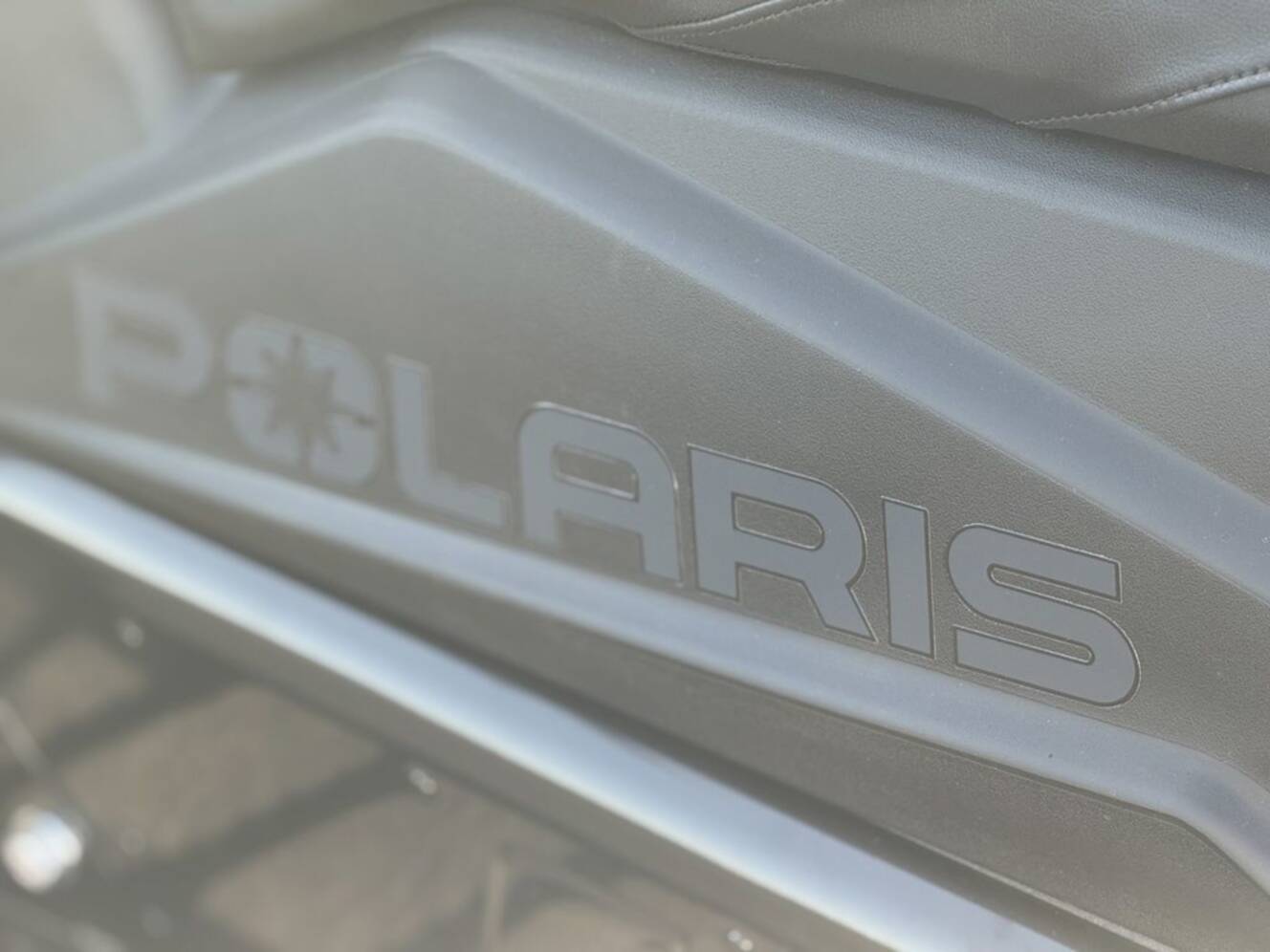 A photo of this 2026 Polaris 850 RMK Khaos 165 Gloss Black / Blue Dusk 850