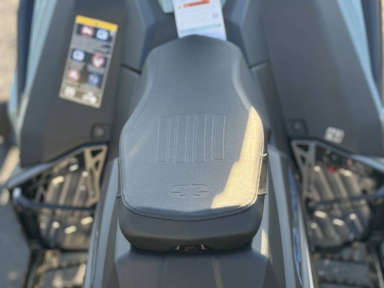 A photo of this 2026 Polaris 850 RMK Khaos 155 Gloss Black / Blue Dusk 850
