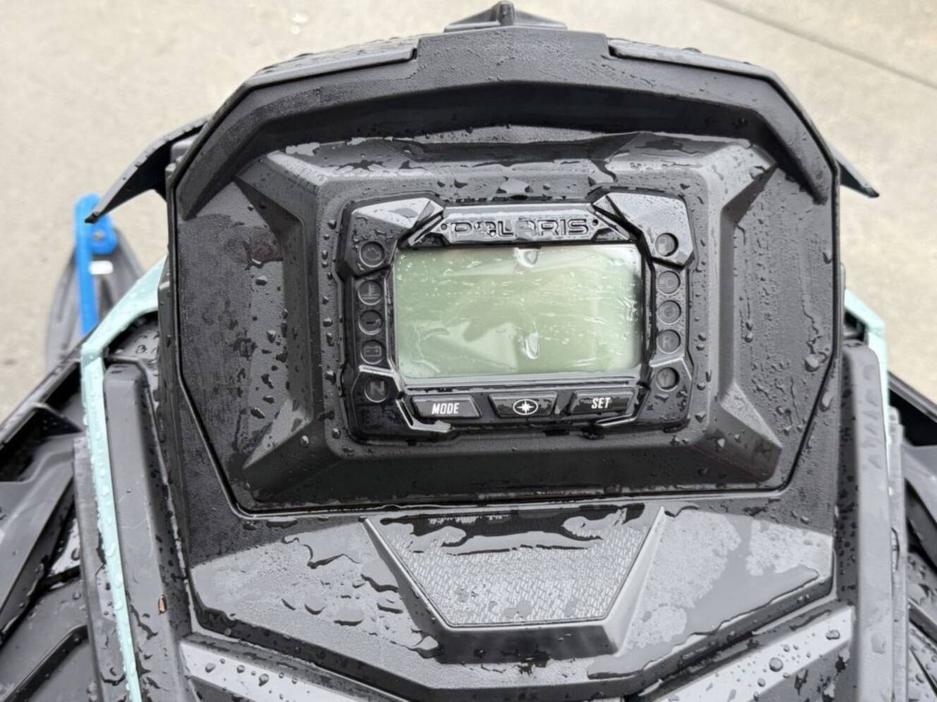 A photo of this 2026 Polaris 850 RMK Khaos 155 Gloss Black / Blue Dusk 850