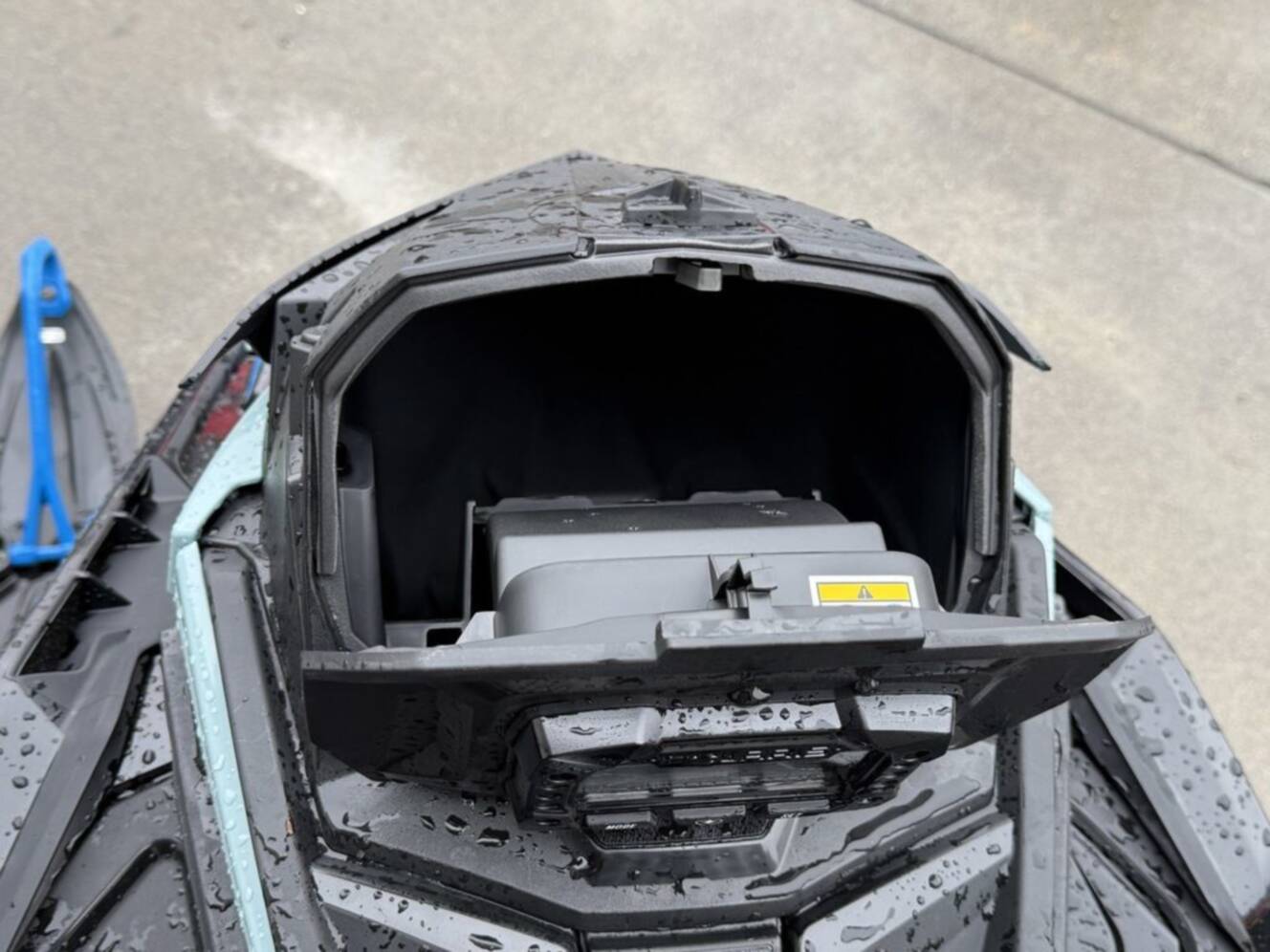 A photo of this 2026 Polaris 850 RMK Khaos 155 Gloss Black / Blue Dusk 850